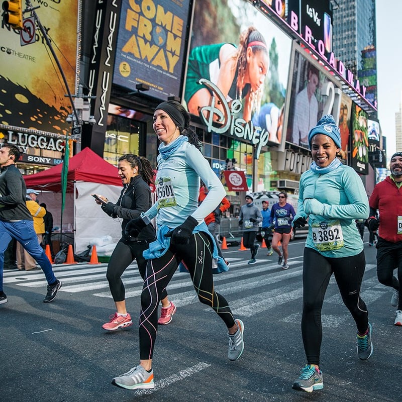 Runners in Time Square at the United Airlines NYC Half