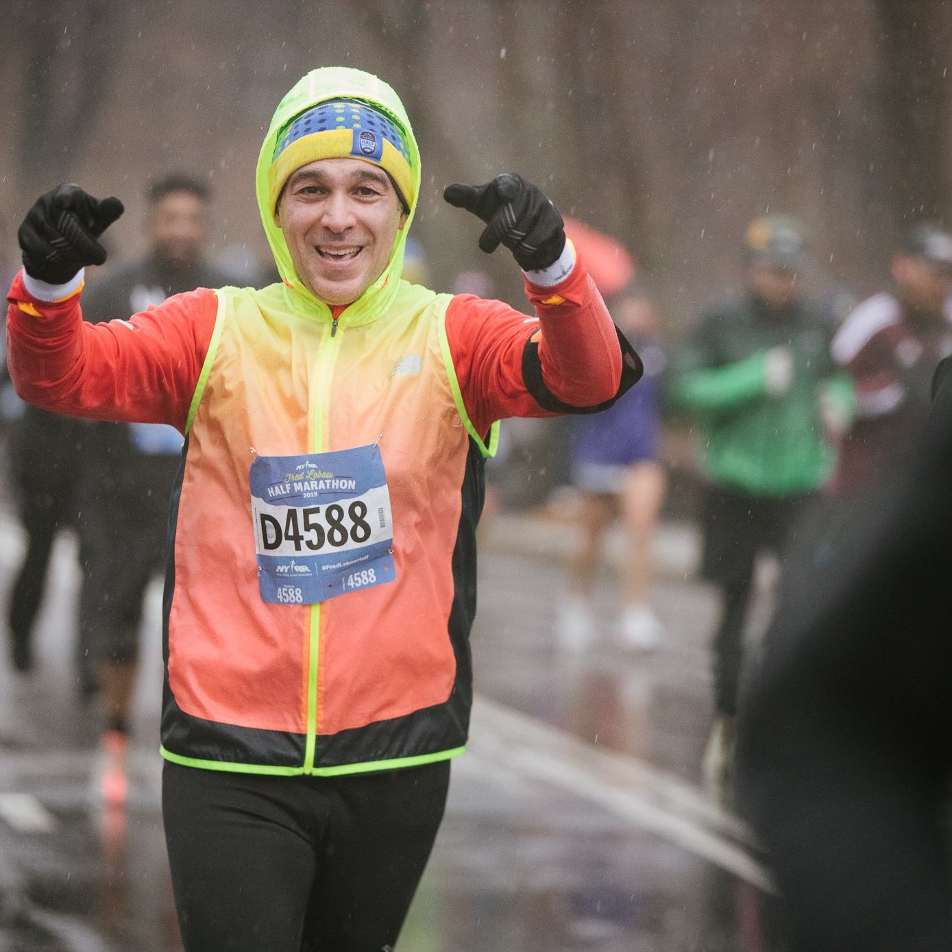 A man running in the rain in Central Park