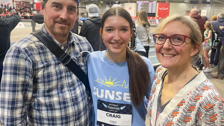 Evelyn Craig and her parents at the 2024 New Balance Indoor Nationals
