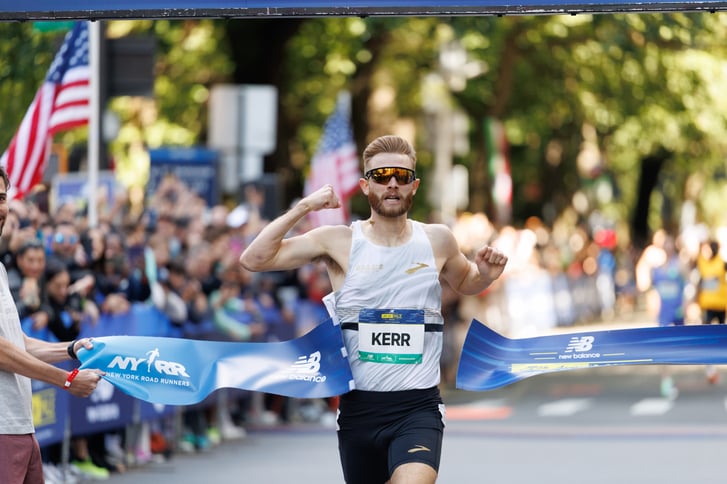 Josh Kerr breaking the tape at the 2024 New Balance 5th Avenue Mile