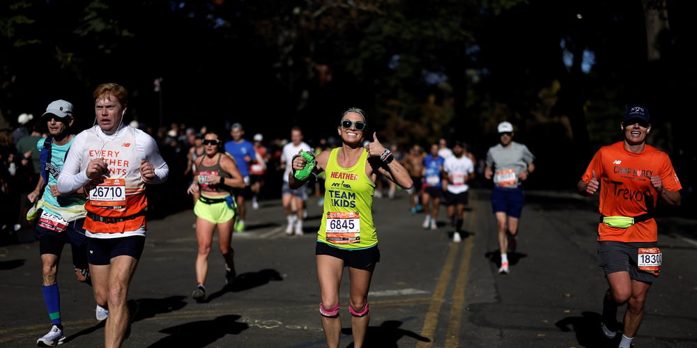 Team for Kids runner and other runners at the 2024 TCS New York City Marathon