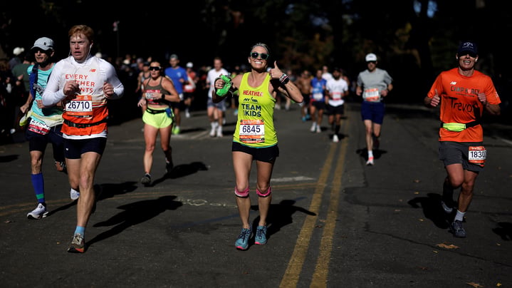 Team for Kids runner and other runners at the 2024 TCS New York City Marathon