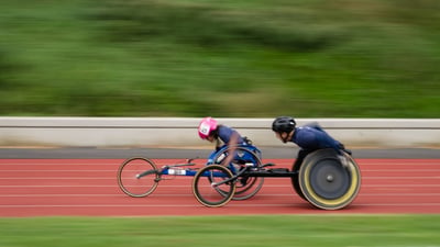 Youth wheelchair athlete on the track.