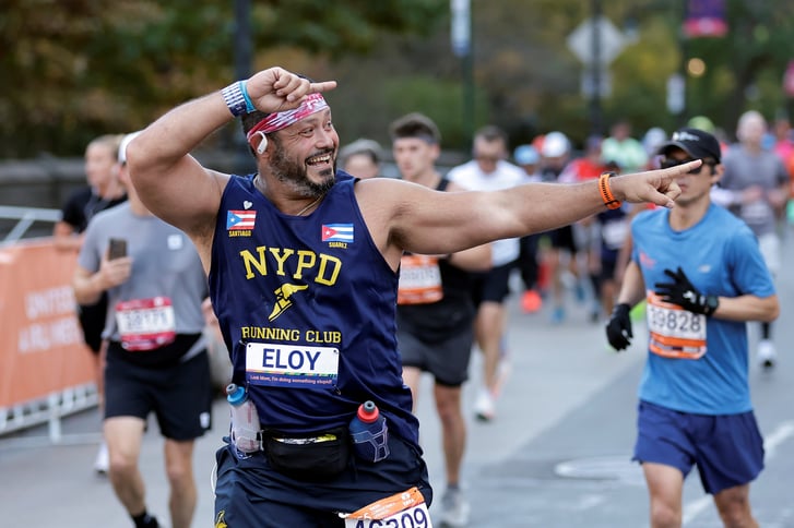 NYPD runner on course at 2024 TCS NYC Marathon