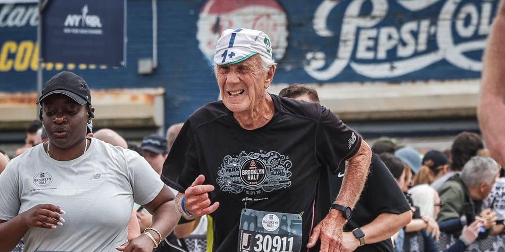 Bob Denker running on the boardwalk near the finish of the 2024 RBC Brooklyn Half