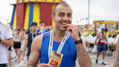 2025 RBC BrooklynHalf finisher with medal