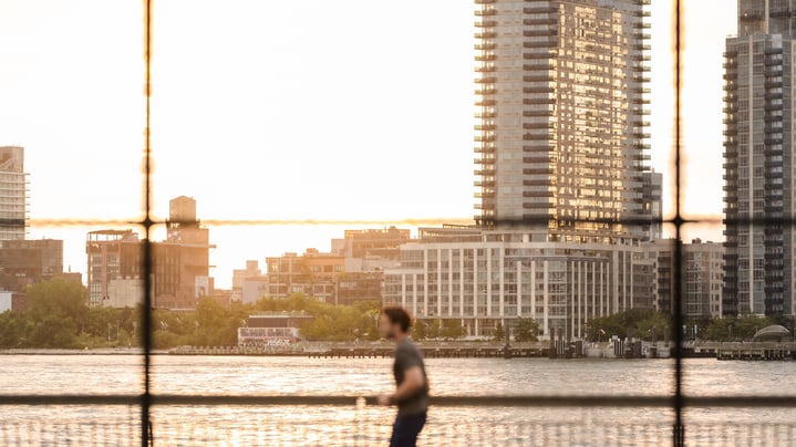 A runner from a distance at the East River Track in Manhattan in 2024