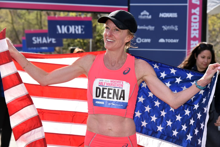 Deena Kastor celebrates with the American flag