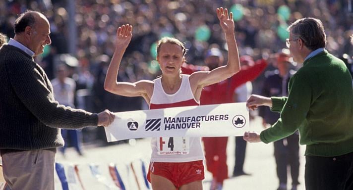 Grete Waitz breaks the finish-line tape at the New York City Marathon