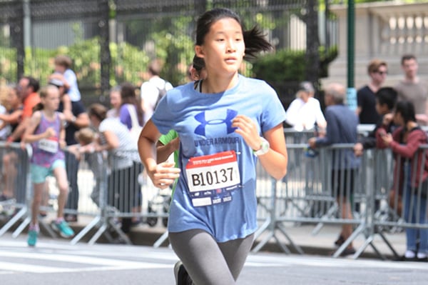 Raven Tang running in 5th Avenue Mile