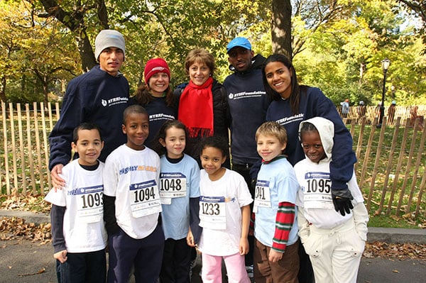 Grete Waitz with pro athletes and youth at Run with Champions