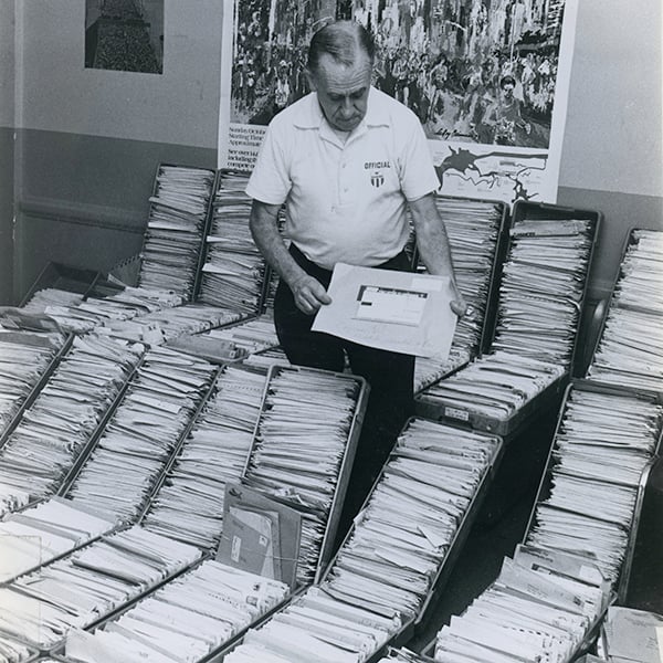 Joe Kleinerman sorting mail