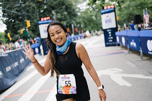 Woman after finishing 2021 NY Mini 10K