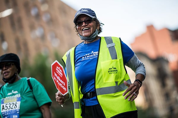 Striders coach Nereida Munoz in a race