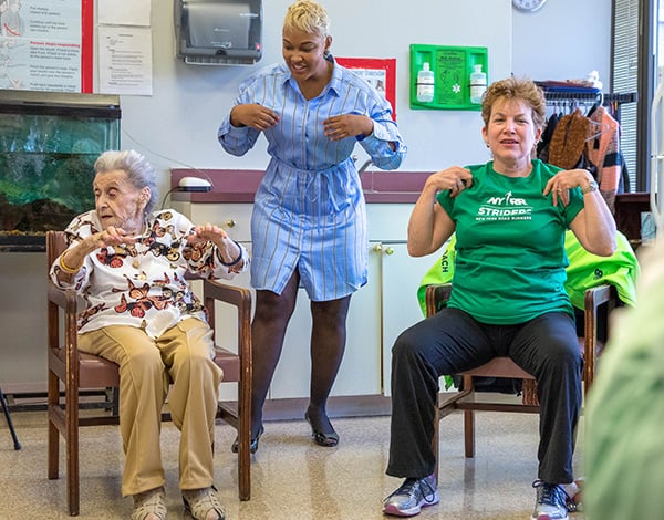 Striders coach Kathy Walker with Striders at a senior center