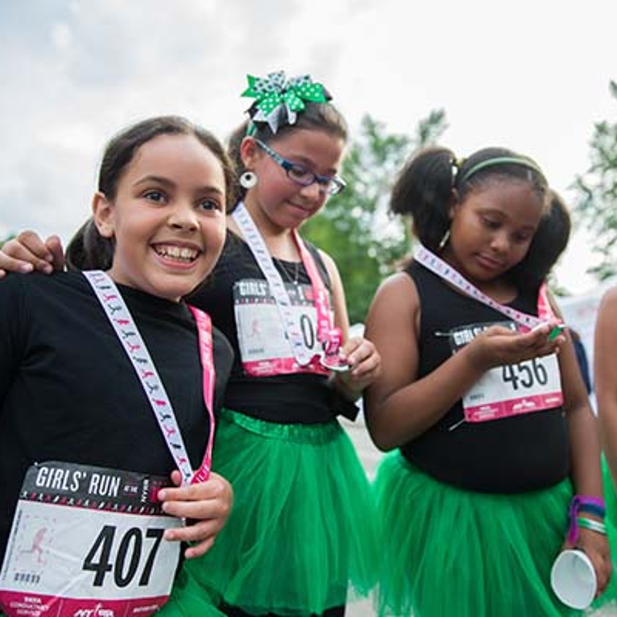 Girls receiving medals at 2016 NYRR NY Mini