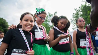 Girls receiving medals at 2016 NYRR NY Mini