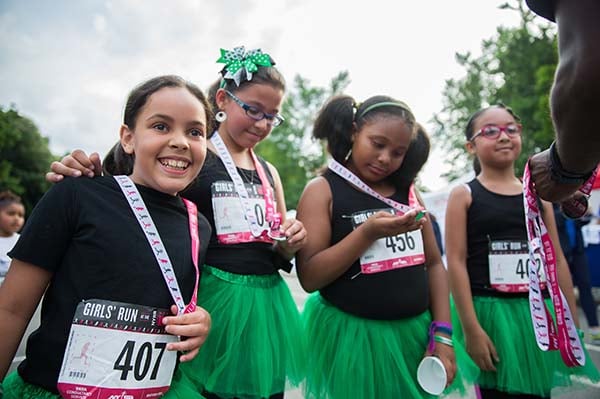 Girls receiving medals at 2016 NYRR NY Mini