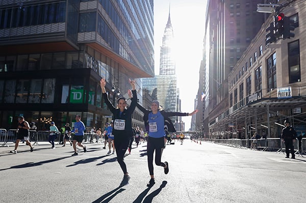 Two runners on 42nd St at 2022 UA NYC Half