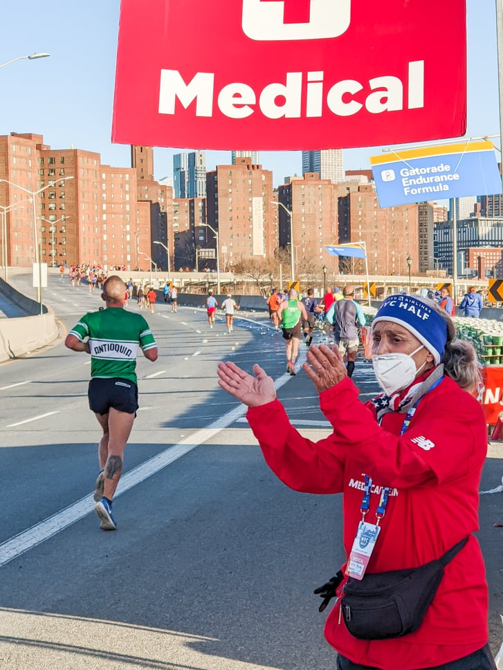 Estelle Young volunteering at 2023 UA NYC Half