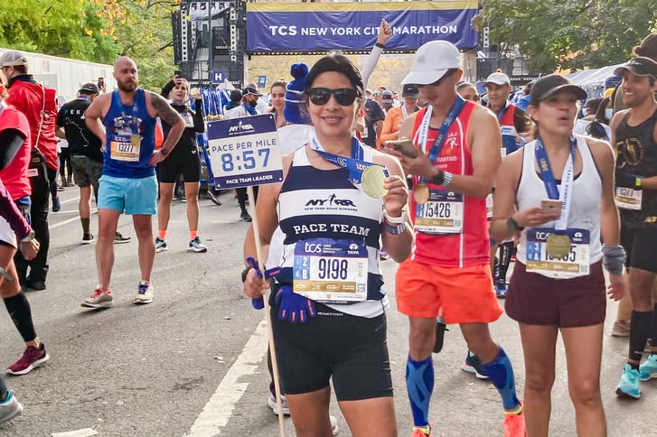 Keila Merino as NYRR pacer after crossing finish line of 2021 TCS NYC Marathon
