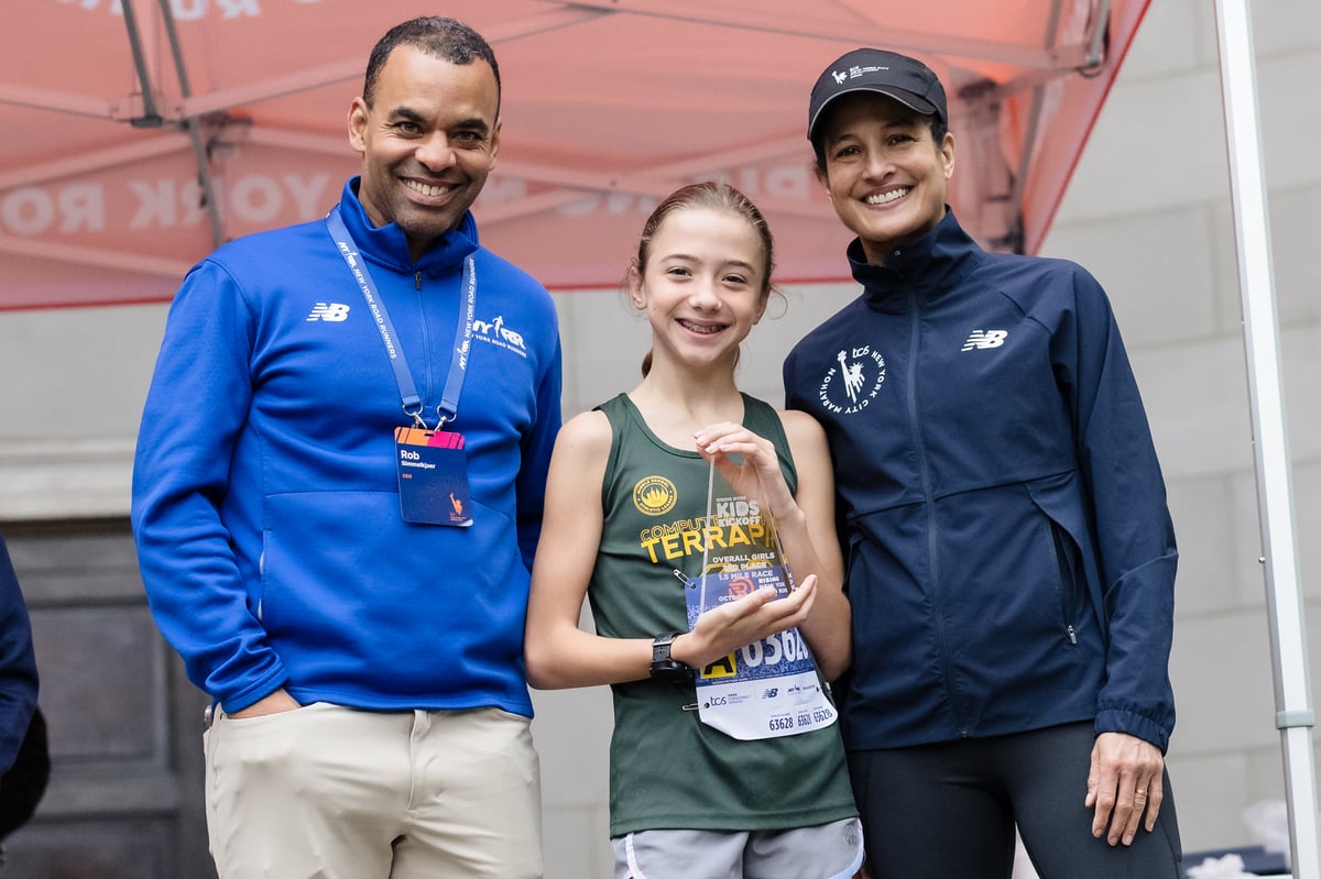 Rob Simmelkjaer and Nnenna Lynch with RNYRR Kids Kickoff 2023 award winner.