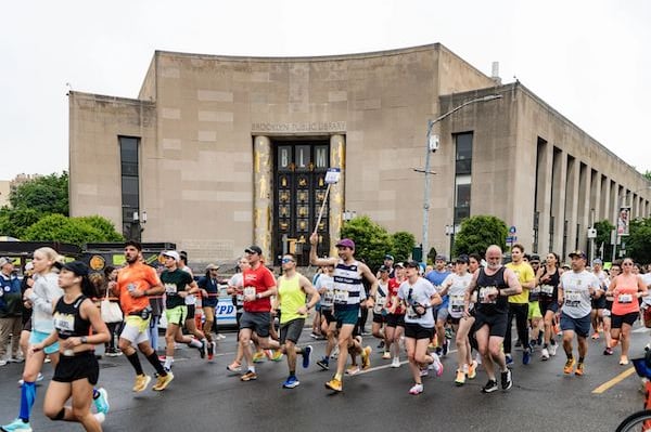 Runners in front of the Brooklyn Public Library on the RBC Brooklyn Half course.