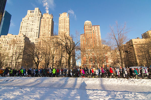Central Park scene with runners in snow