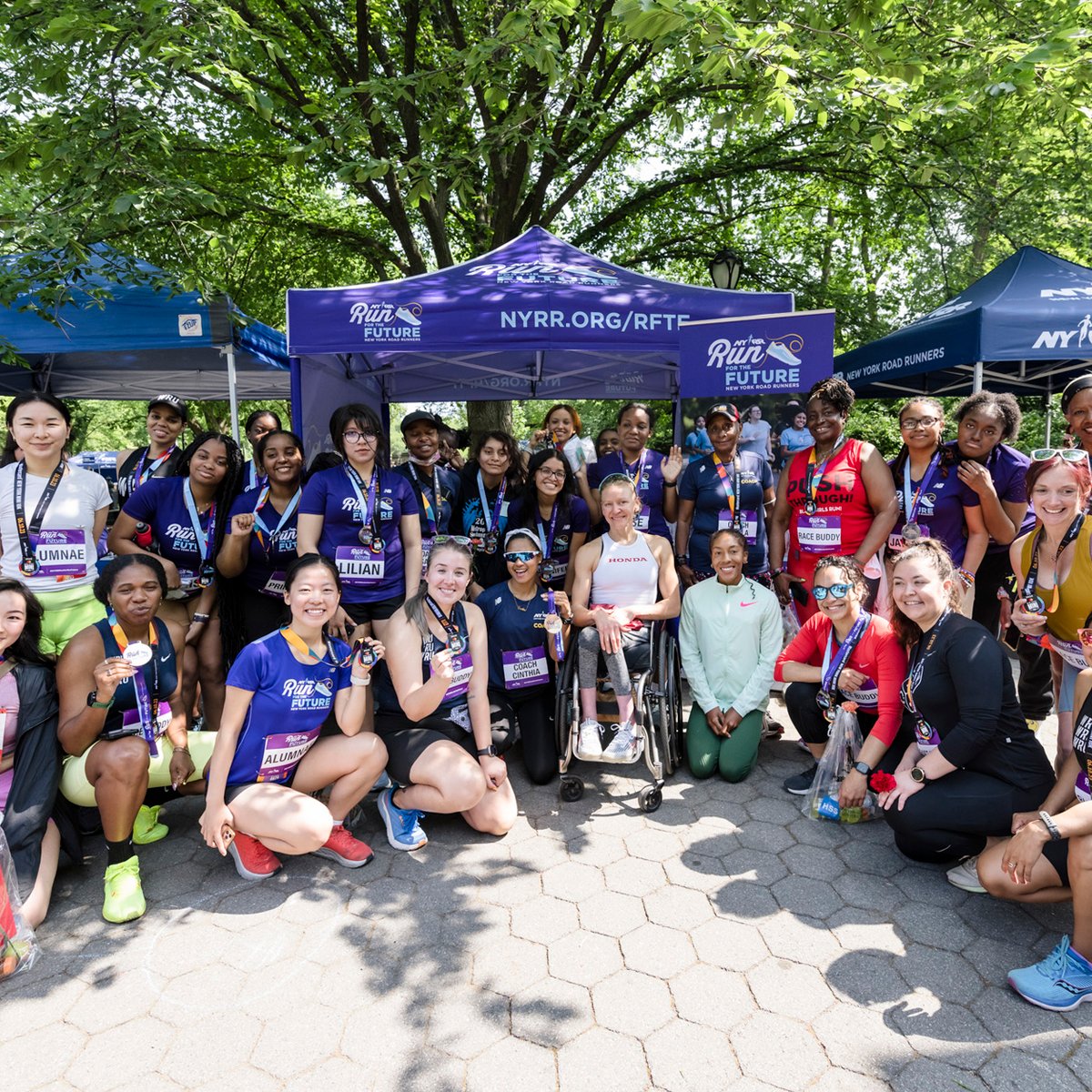 Susannah Scaroni with NYRR Run for the Future girls at the 2023 Mastercard NY Mini 10K