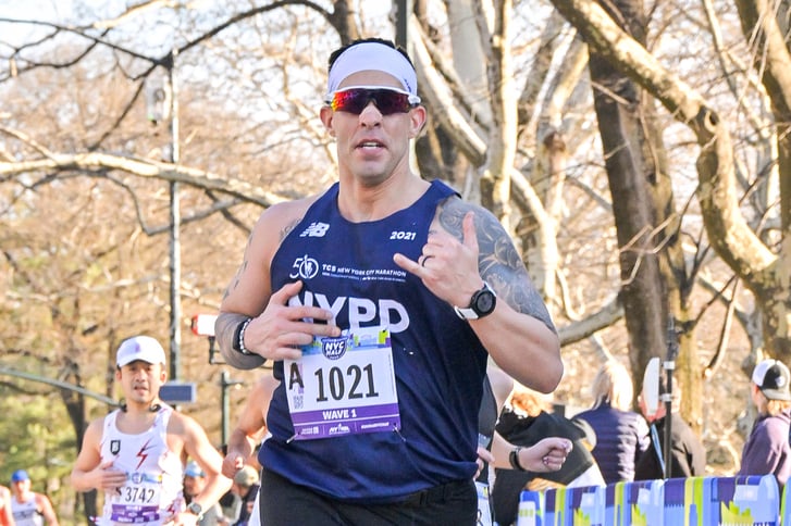 Runner near finish of United Airlines NYC Half in Central Park