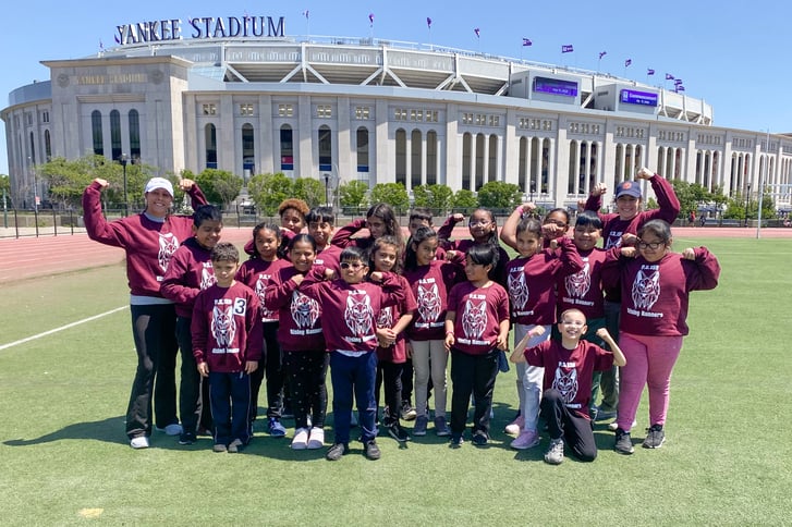 Sally Bojorquez and students in front of Yankee Stadium