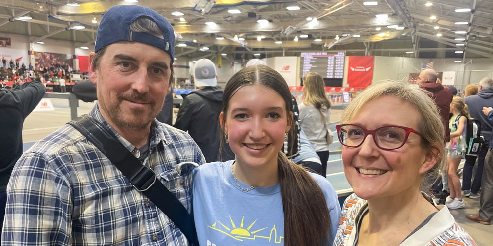 Evelyn Craig and her parents at the 2024 New Balance Indoor Nationals