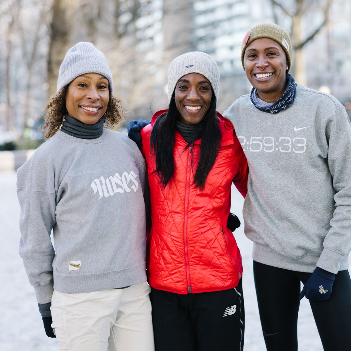 Runners Erica Stanley-Dottin, Rolanda Bell, and Dannielle McNeilly in Central Park on snowy day.