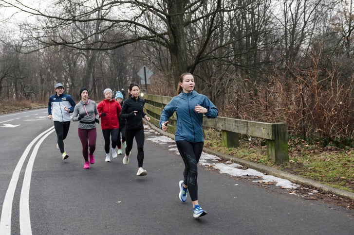 NYRR Group Training runners in Prospect Park on a cold day in 2024