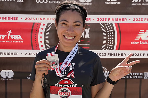 Kia Copeland with medal after 2023 New Balance Bronx 10 Mile