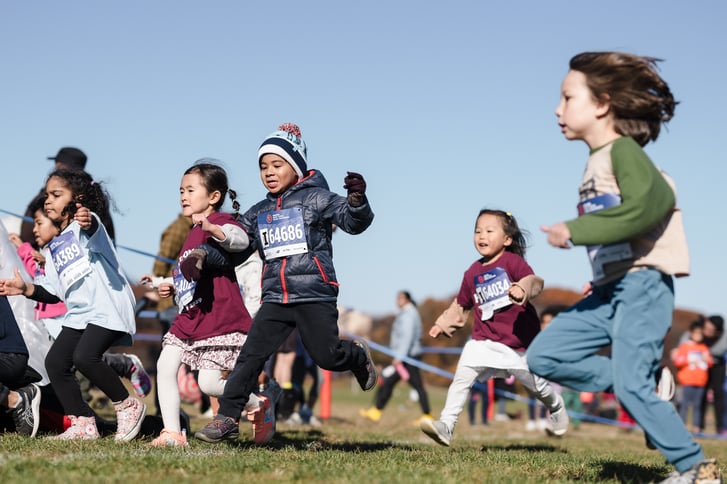 Kids running NYRR cross country race in Van Cortlandt Park November 19 2023