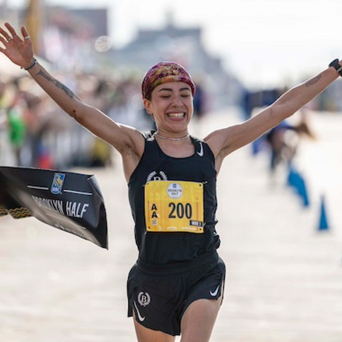 Sofia Camacho Ferral breaks the tape at the RBC Brooklyn Half.