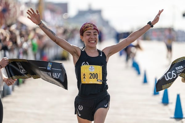 Sofia Camacho Ferral breaks the tape at the RBC Brooklyn Half.