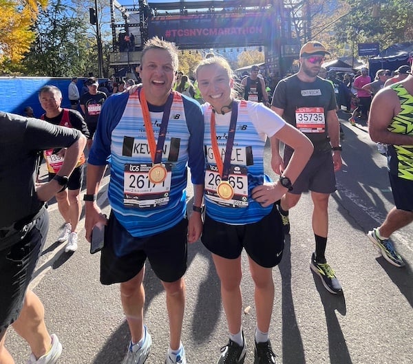 Team for Climate runners at the marathon finish line.