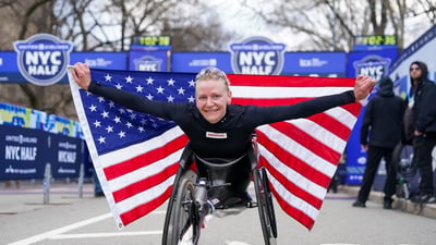 Susannah Scaroni with American flag at 2024 UA NYC Half