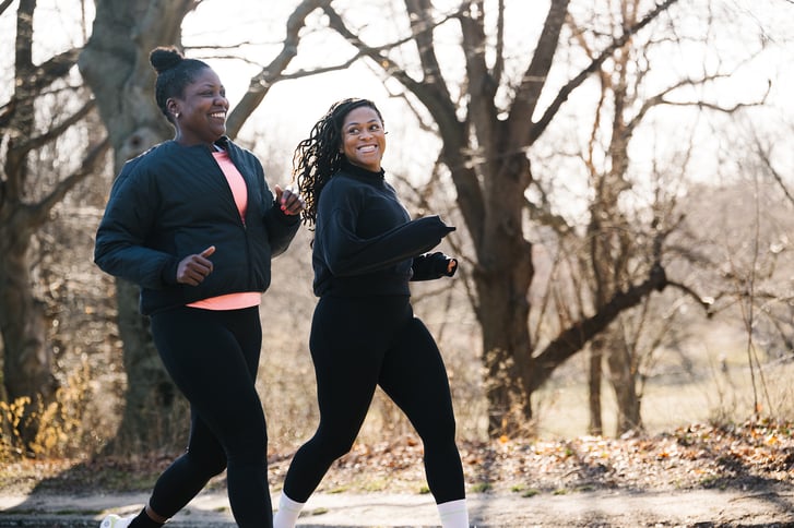 Cheryl Donald and Victoria Fortune running and smiling in Prospect Park