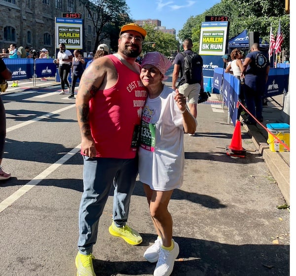 Gabe and Olga pose at the Harlem 5K
