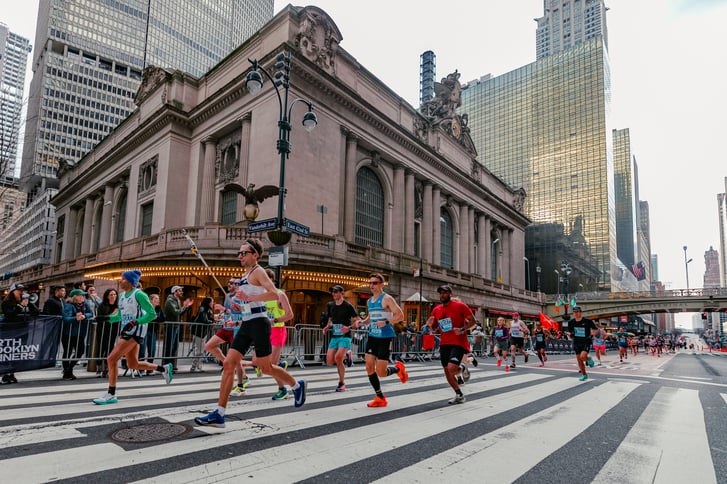 UA NYC Half 2024 runners passing Grand Central Terminal