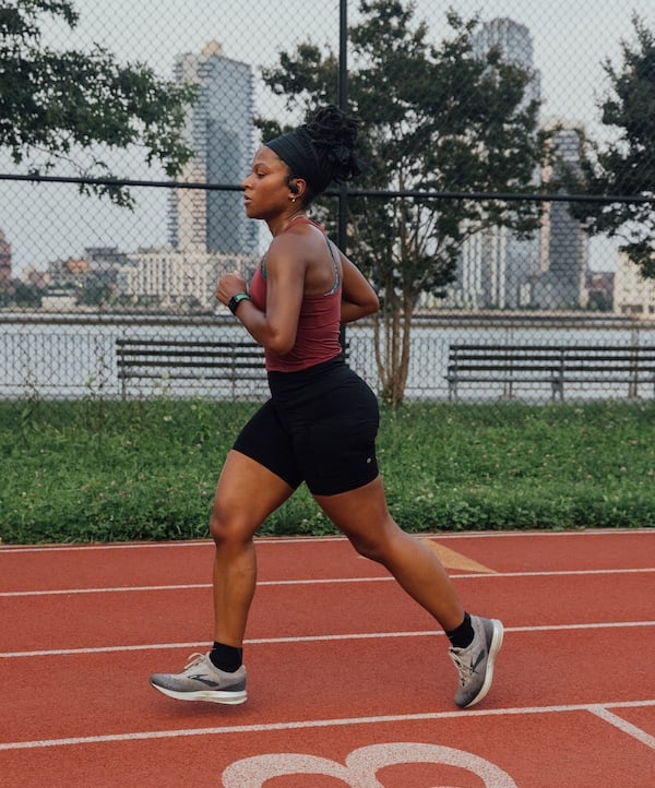 Victoria running on the track.