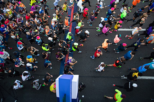 Group of runners from above at start of 2019 TCS NYC Marathon