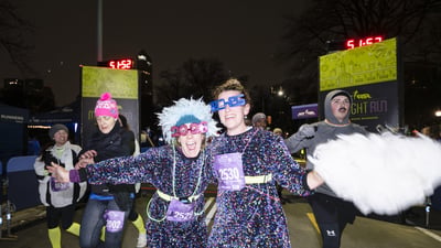Runners at the 2025 NYRR Midnight Run