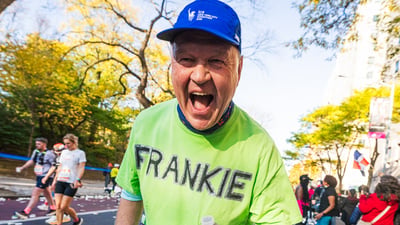Runner smiling at camera
