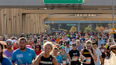 Runners under Willis Avenue Bridge