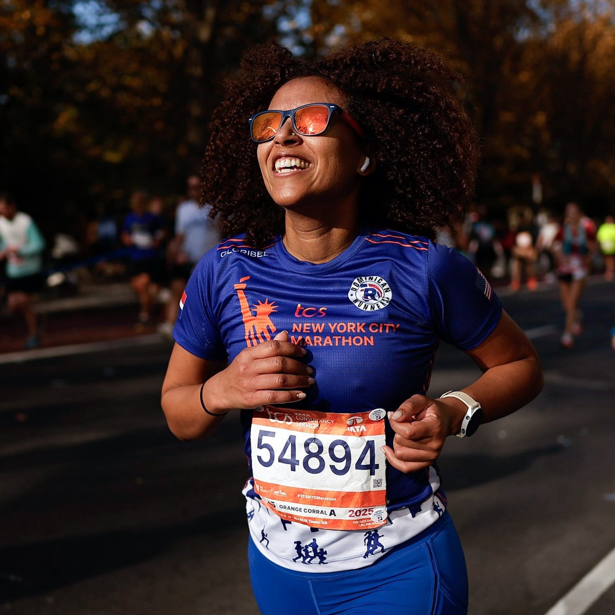 Runner smiling while running