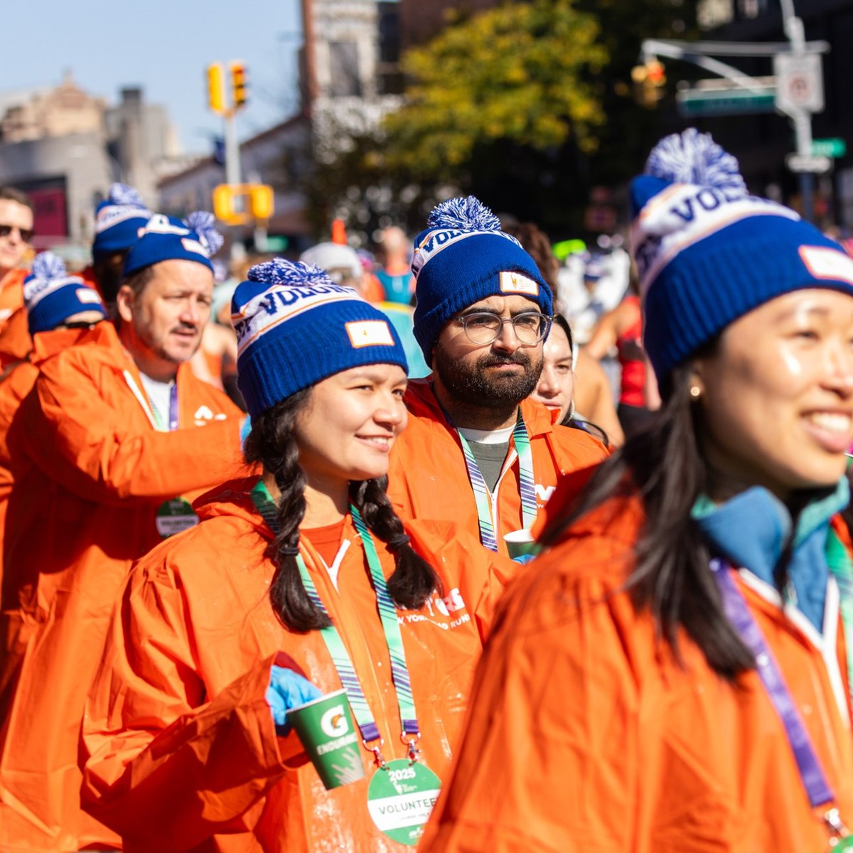 Volunteers watching runners